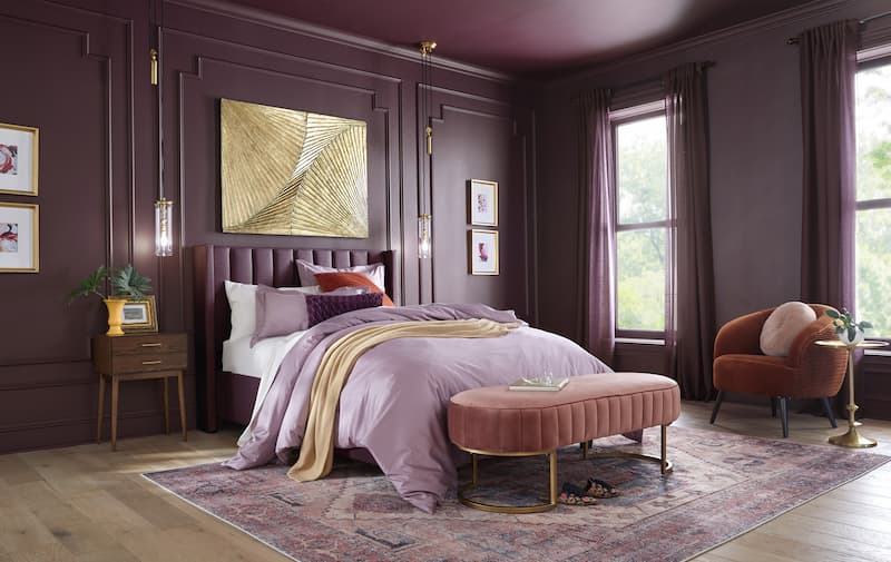 Glidden's Paint Color of the Year is Purple Basil, shown here in a bedroom