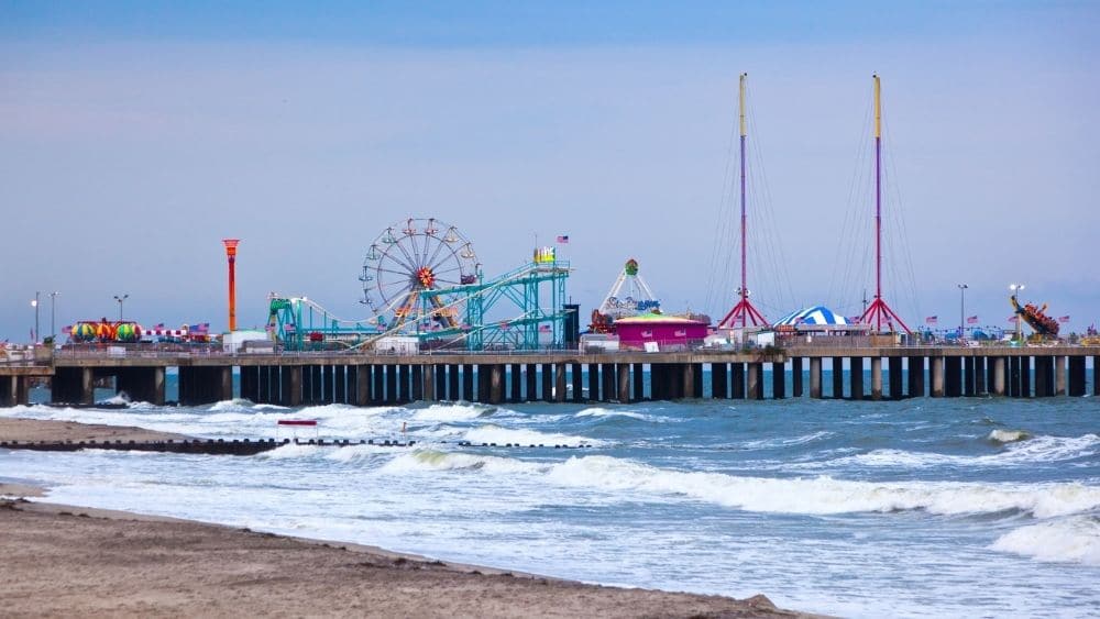 Carnival pier in Atlantic City during the daytime.