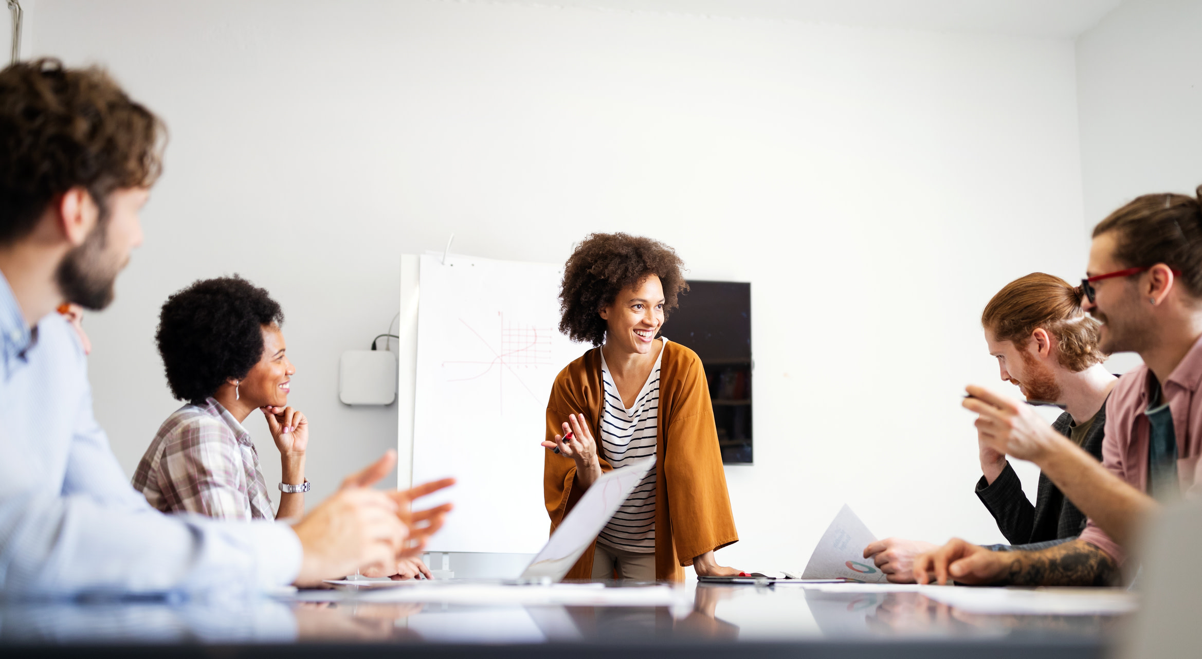 A woman leading a meeting.