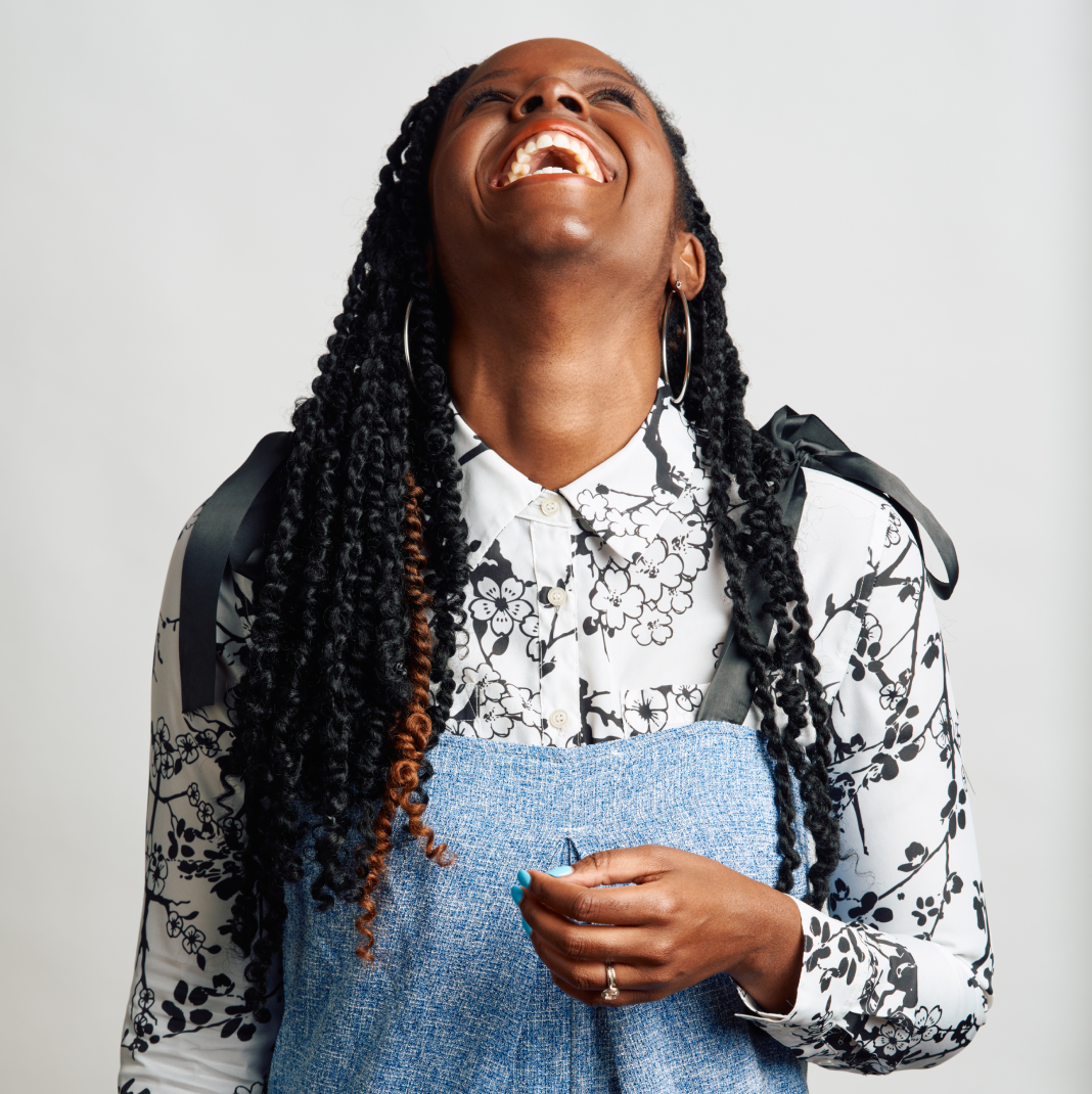 Contact Us image with a laughing woman