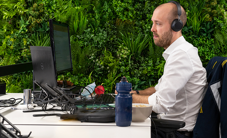 Man looking at laptop.