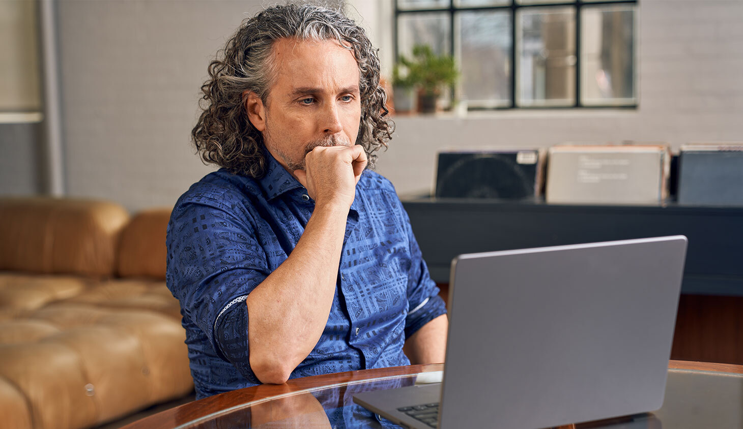 Man looking at laptop