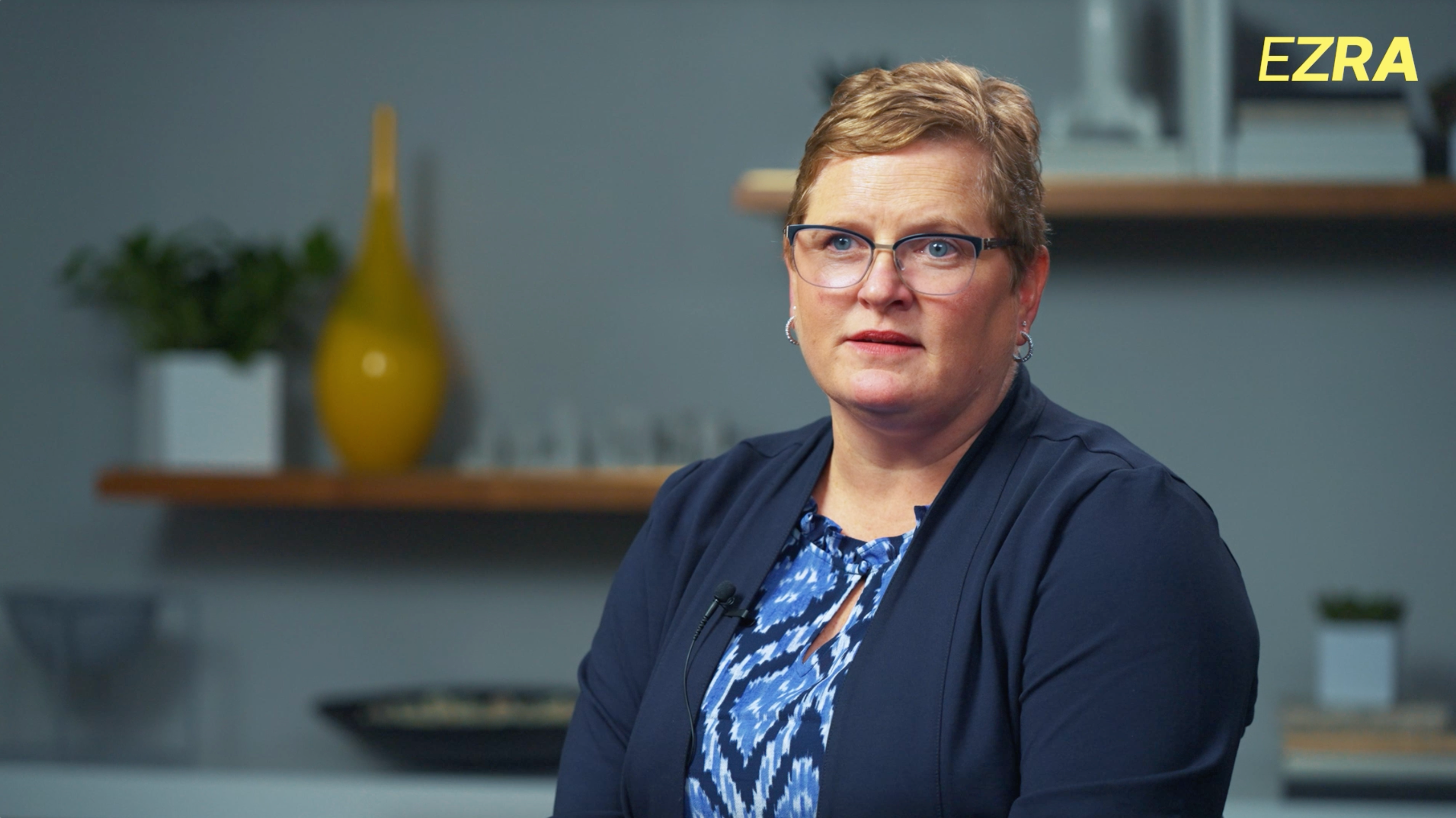 Kate Gill, Executive Leader, L&D, General Electric, wearing a dark blue top