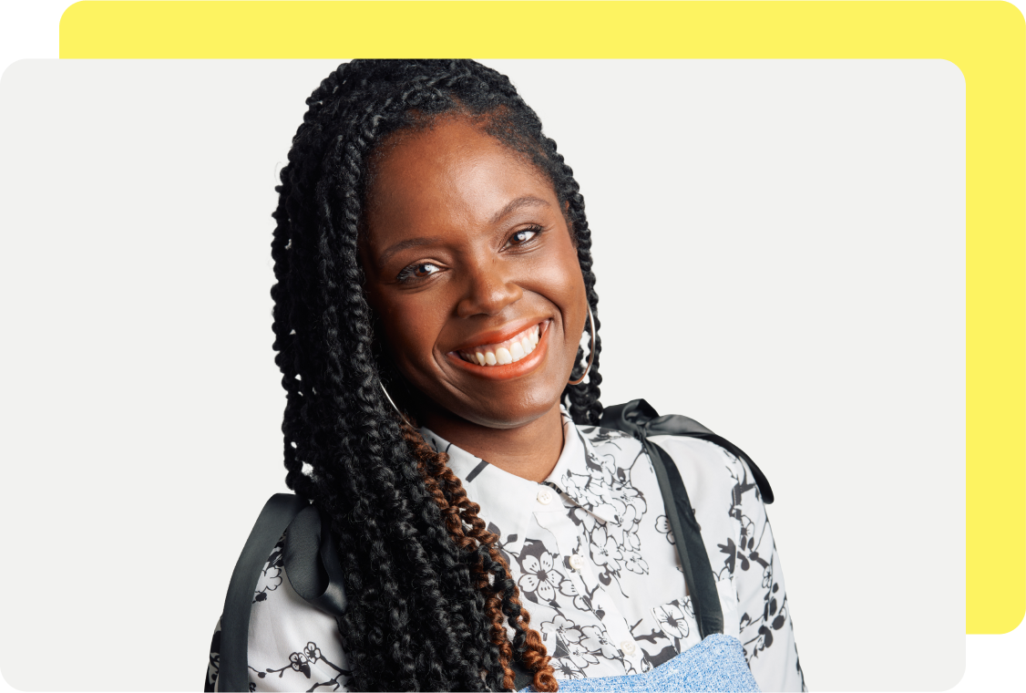 Woman smiling at the camera.