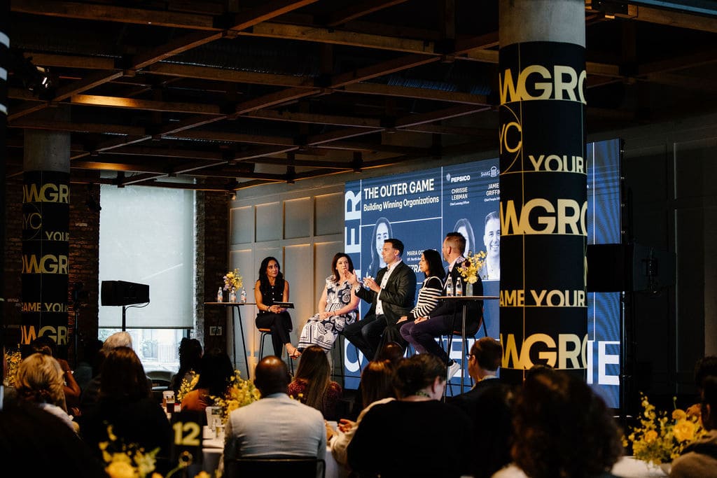 Panel 2 on stage — Maria Gonzalez, Chrissie Leibman, Jamie Griffin, Sunita Holzer, Mike DiClaudio