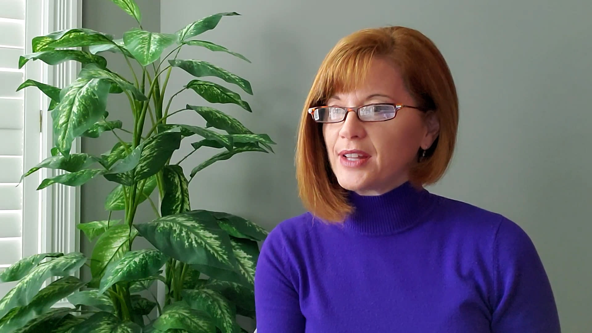 Lynne Watkins, Director of Talent Development at Corus Entertainment, wearing a blue roll-neck top