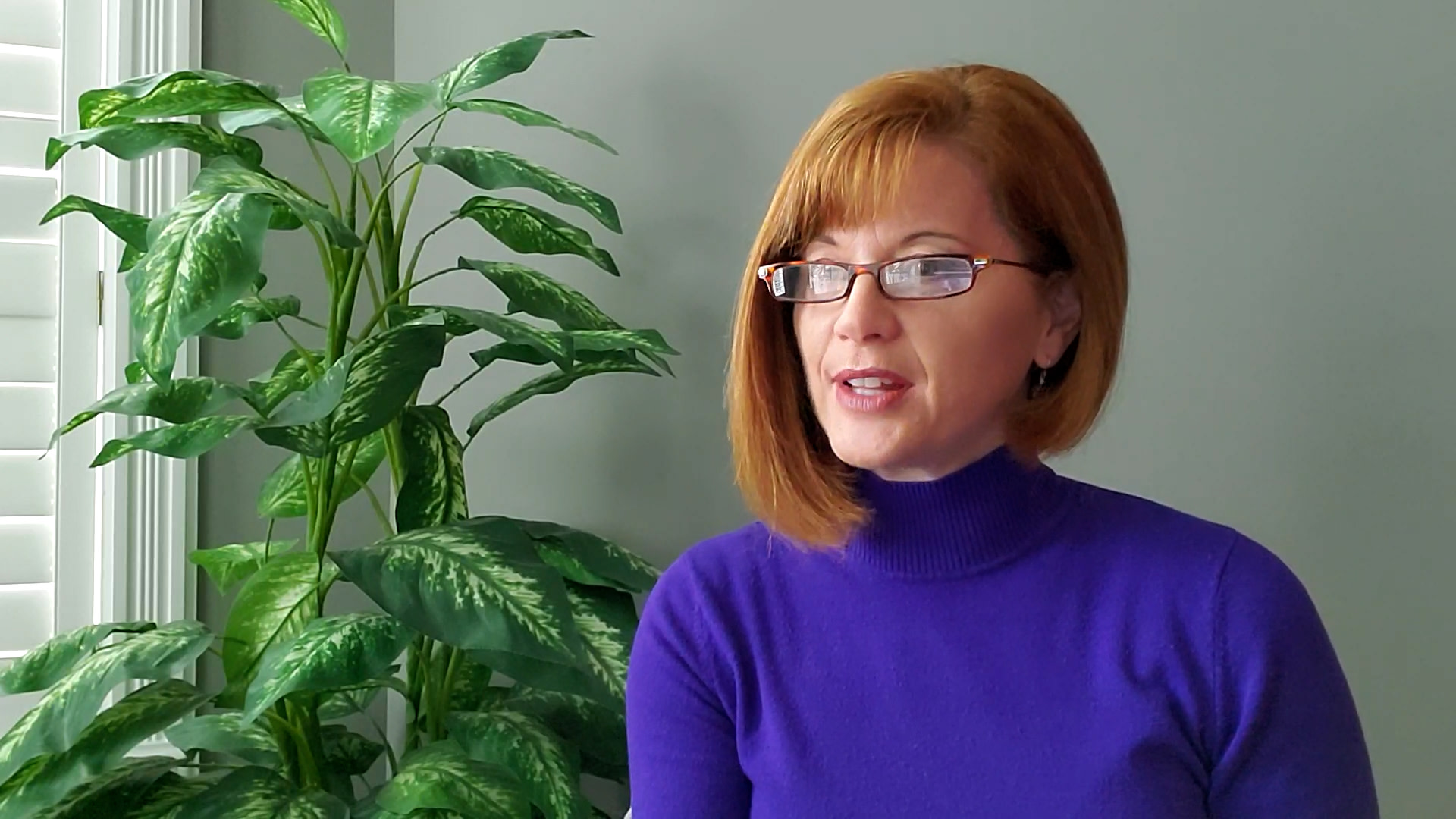 Lynne Watkins, Director of Talent Development at Corus Entertainment, wearing a blue roll-neck top