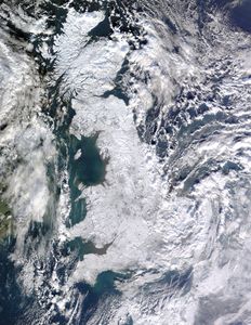 Satellite image of Great Britain covered in snow.
