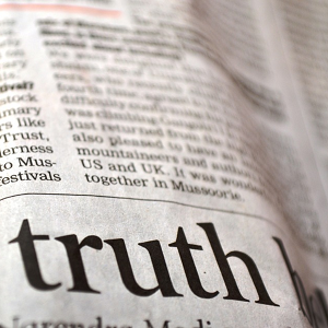 Image of newspaper with headline 'Truth'