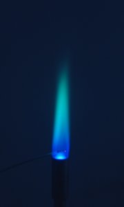 Image of a blue and green flame. 