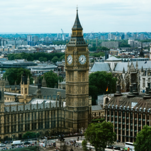 Image of Big Ben tower and houses of parliament during the day. 
