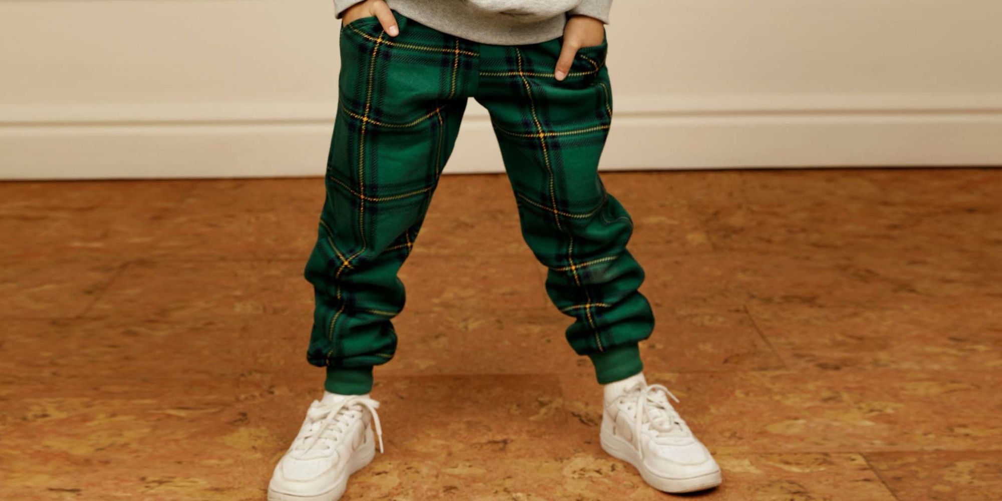 boy wearing Mini Rodini trousers