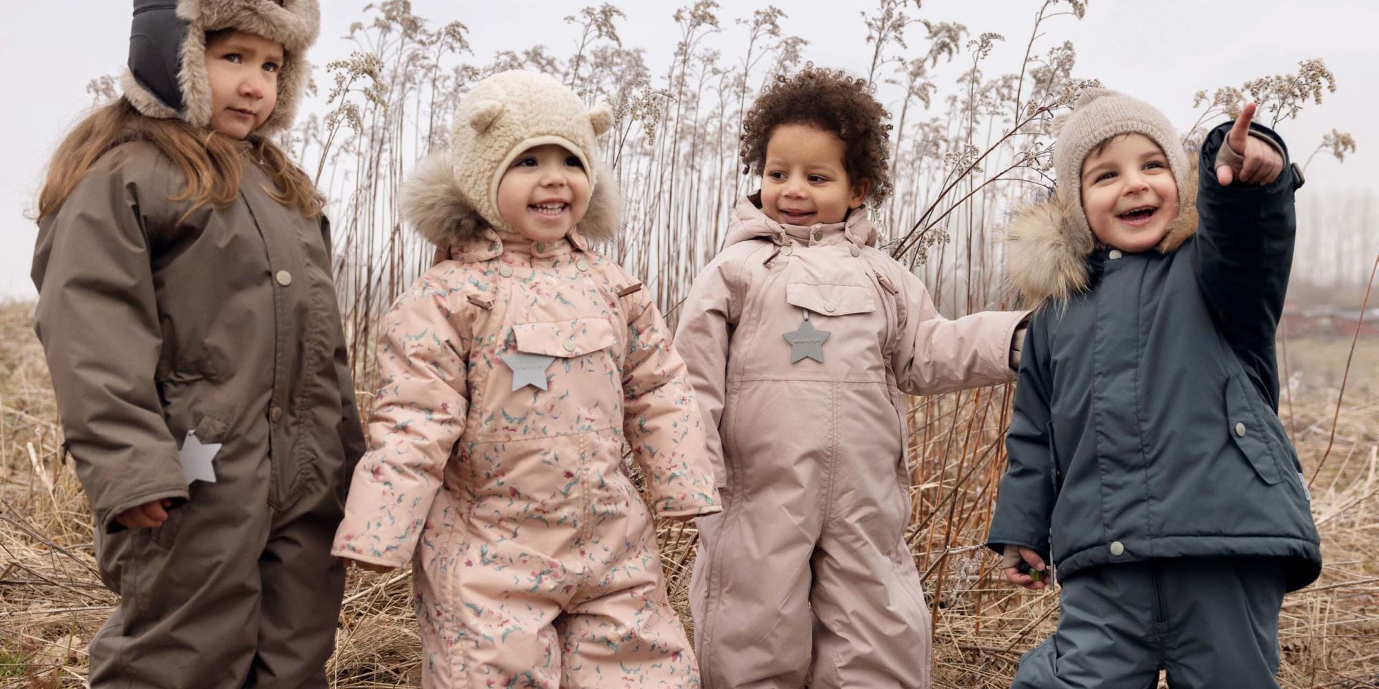 Kids wearing Mini A Ture coveralls