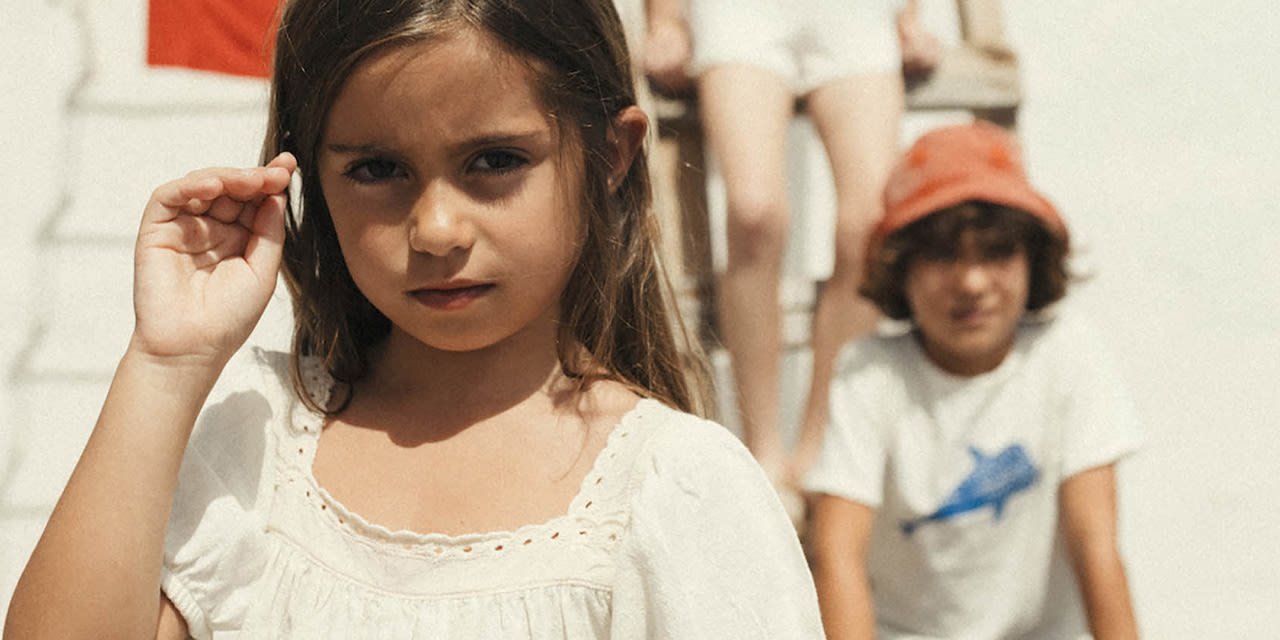 Girl wearing Buho dress, boy wearing Buho t-shirt