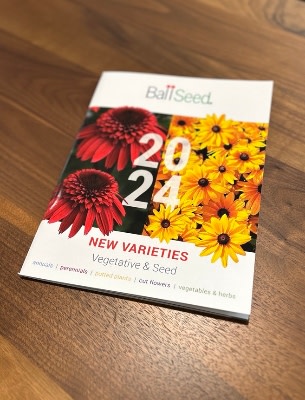 Flower catalog on a wooden table