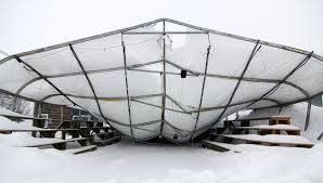 Greenhouse with a sunken roof from heavy snow