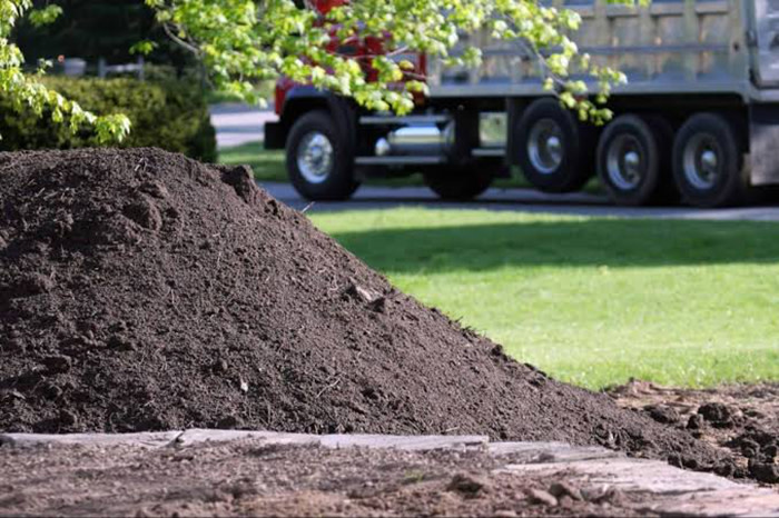 Soil and a truck in a landcape