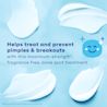 Close-up of Benzoyl Peroxide acne treatment gel white smear on blue background