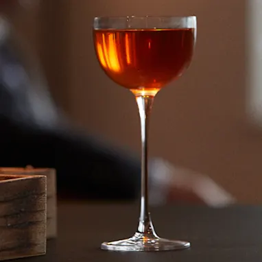 Tasting Glass on a table with a blurred background