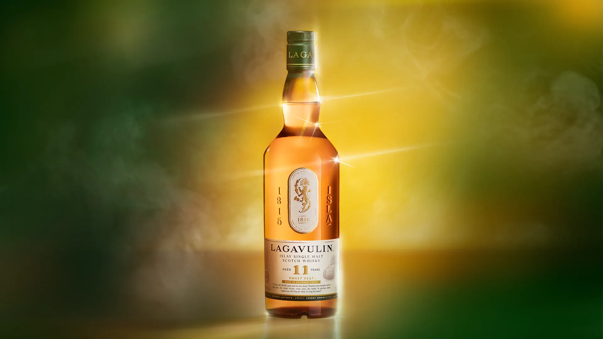 Bottle of Lagavulin 11 Year Old Sweet Peat Islay Single Malt Scotch Whisky, 750ml on green sunrise background 