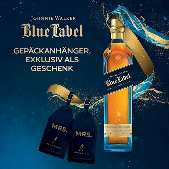Johnnie Walker Mrs Mrs with luggage tags