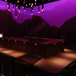 Women taking part of the tasting experience holding a small glass of whisky