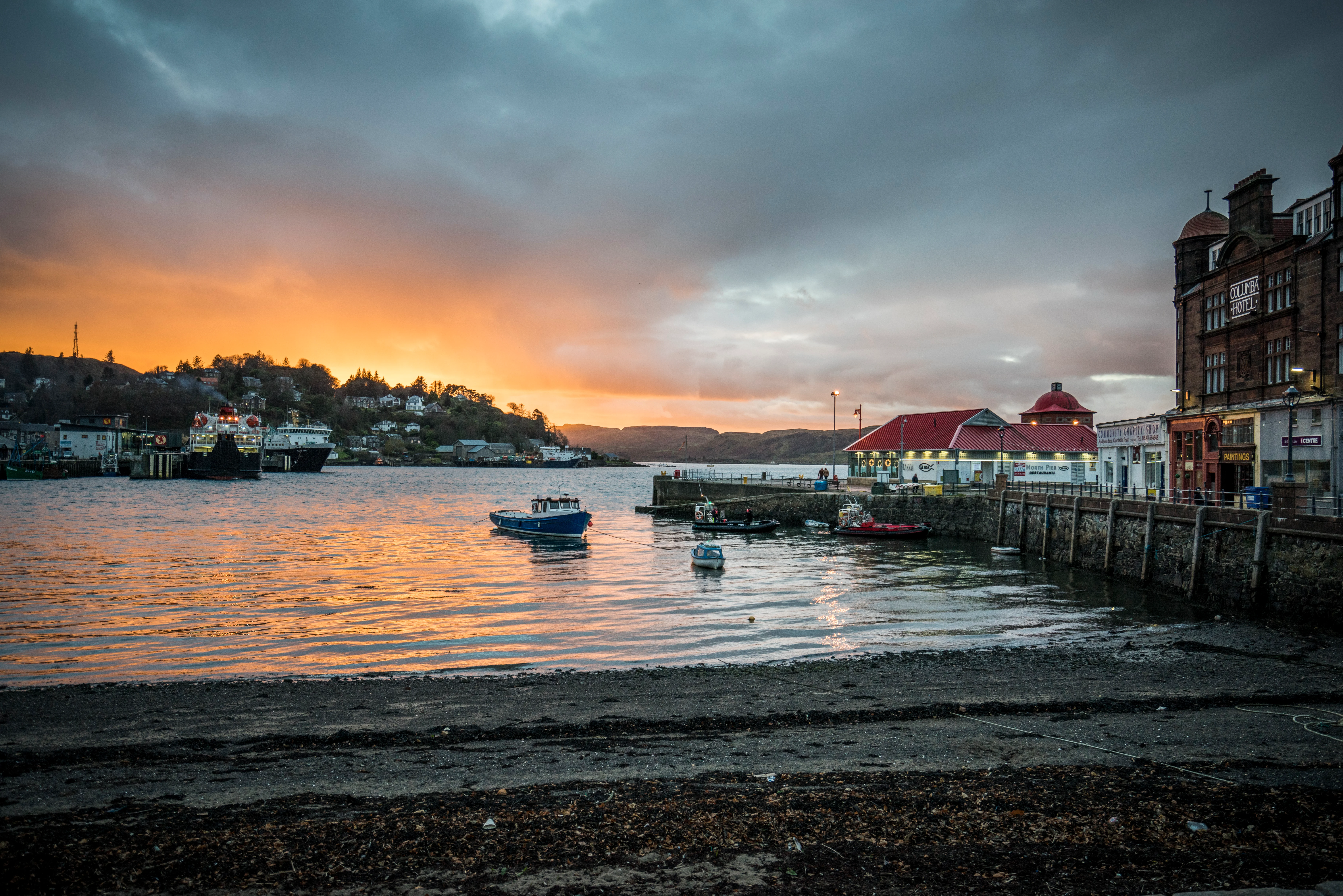 Sunset across the sea outside the Oban distillery