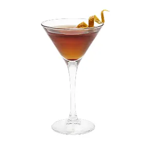 A brown cocktail in a martini glass with a spiral citrus peel twist garnish