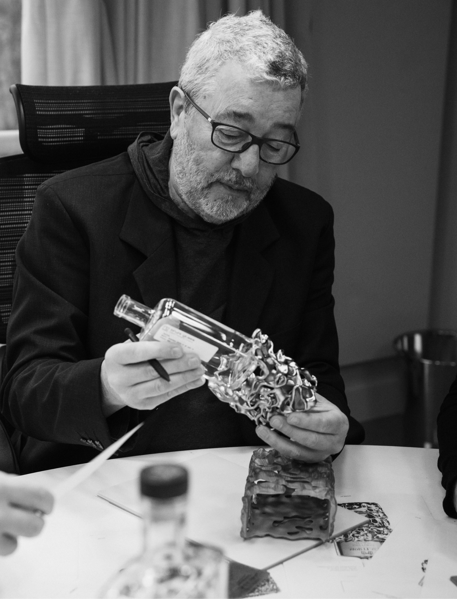 Starck testing out a prototype bottle and housing design together