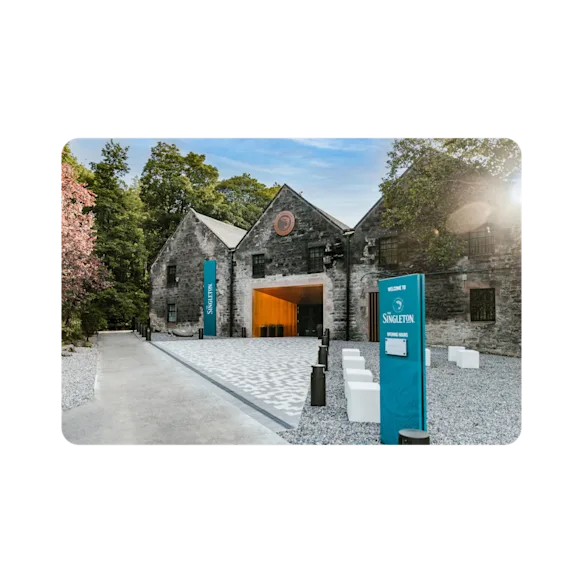 The entrance to the beautiful gray brick building home to The Singleton.