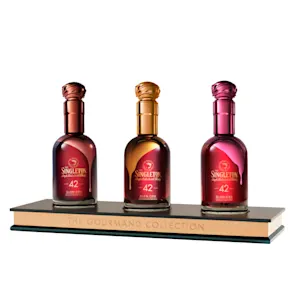 The Gourmand Collection by the Singleton three whisky bottles presented on a plinth