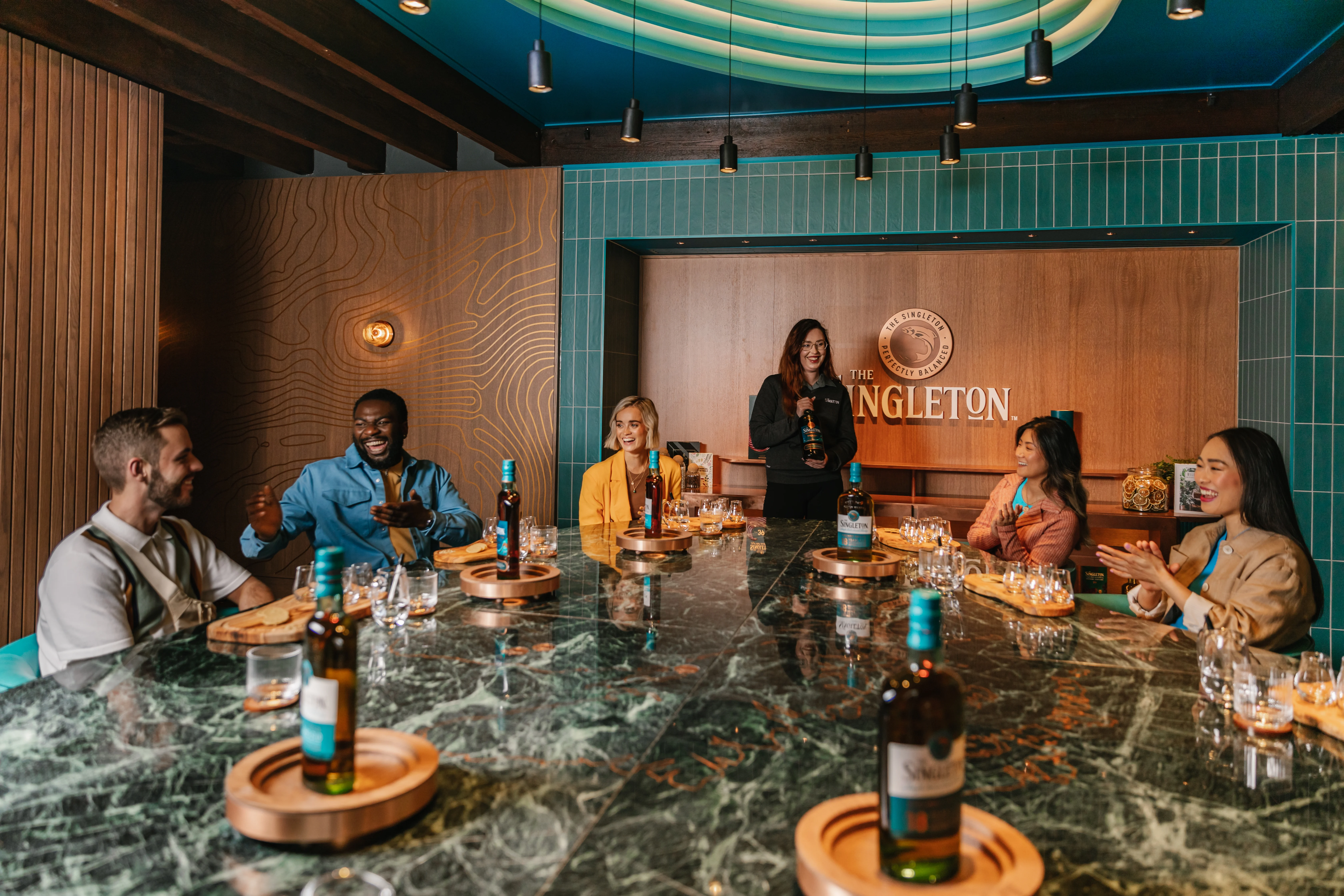 A tour group doing a tasting at Singleton Distillery