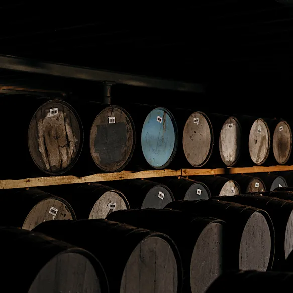 Several whisky barrels were pictured in a warehouse