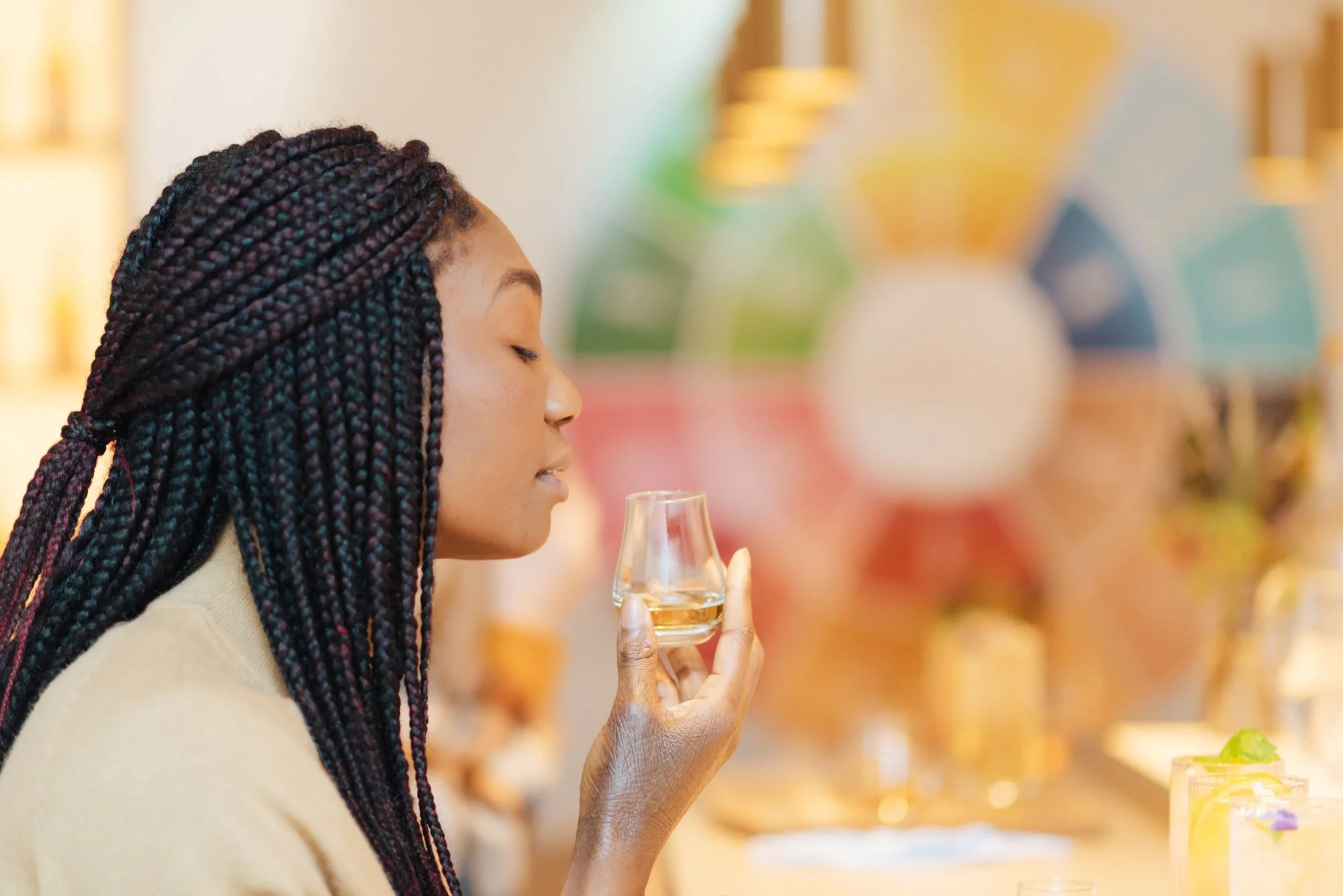 Glenkinchie tour, lady sampling the noes quality of Glenkinchie