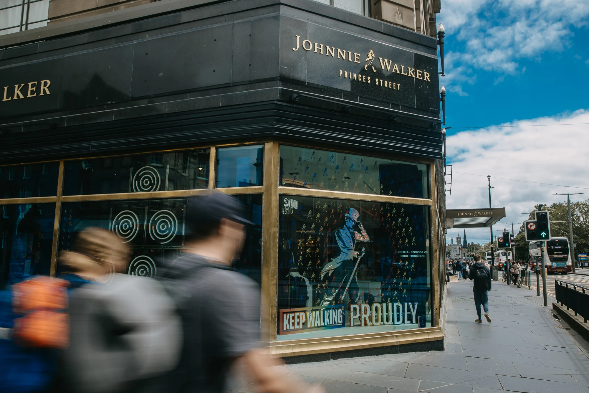 Exterior of Johnnie Walker Princes Street whisky experience in Edinburgh city center.