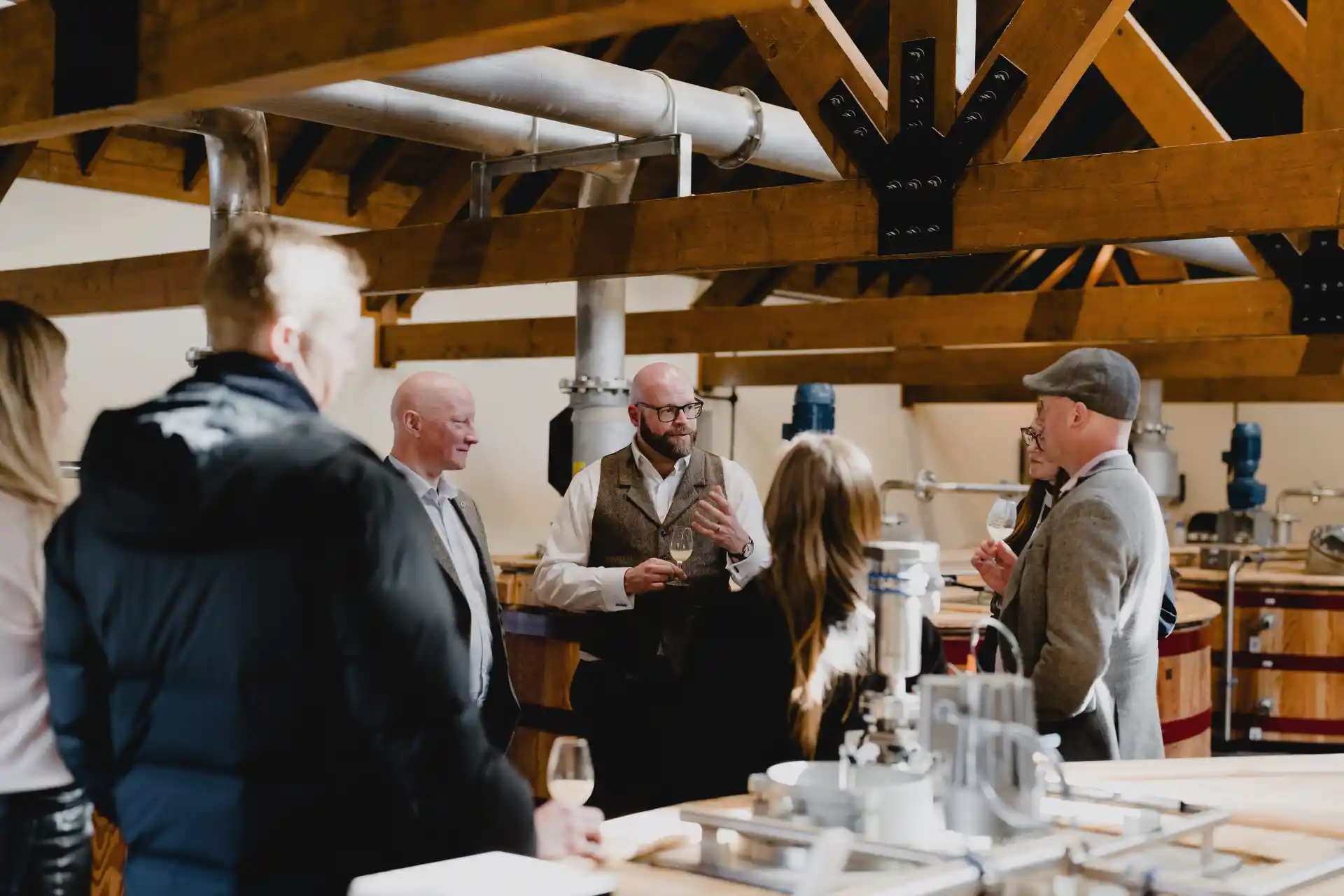 An engaged group sample Brora's finest whisky whilst stood in the distillery.