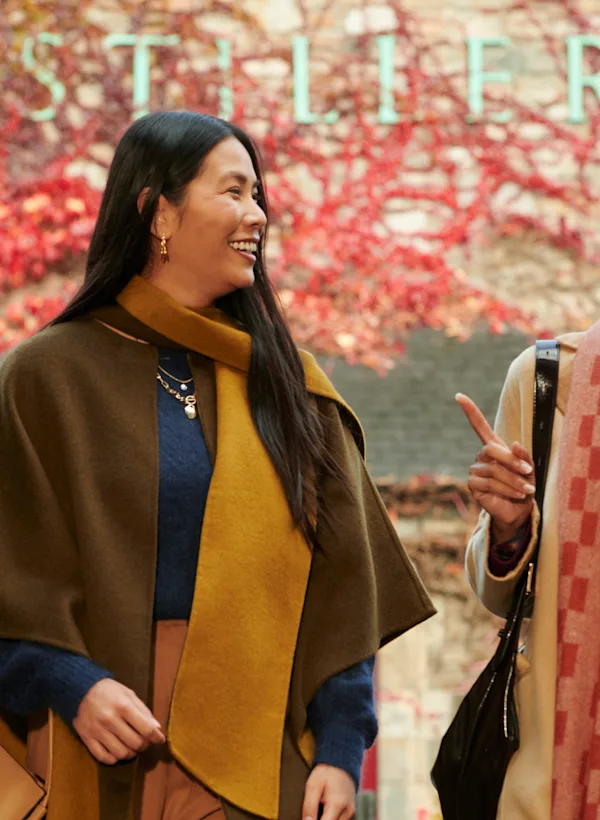 Two women exploring a whisky distillery
