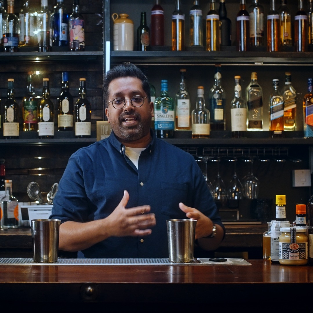 Mr Lyan’s Meadow Old Fashioned cocktail with Lagavulin 16, honey syrup, and lemon verbena sprig