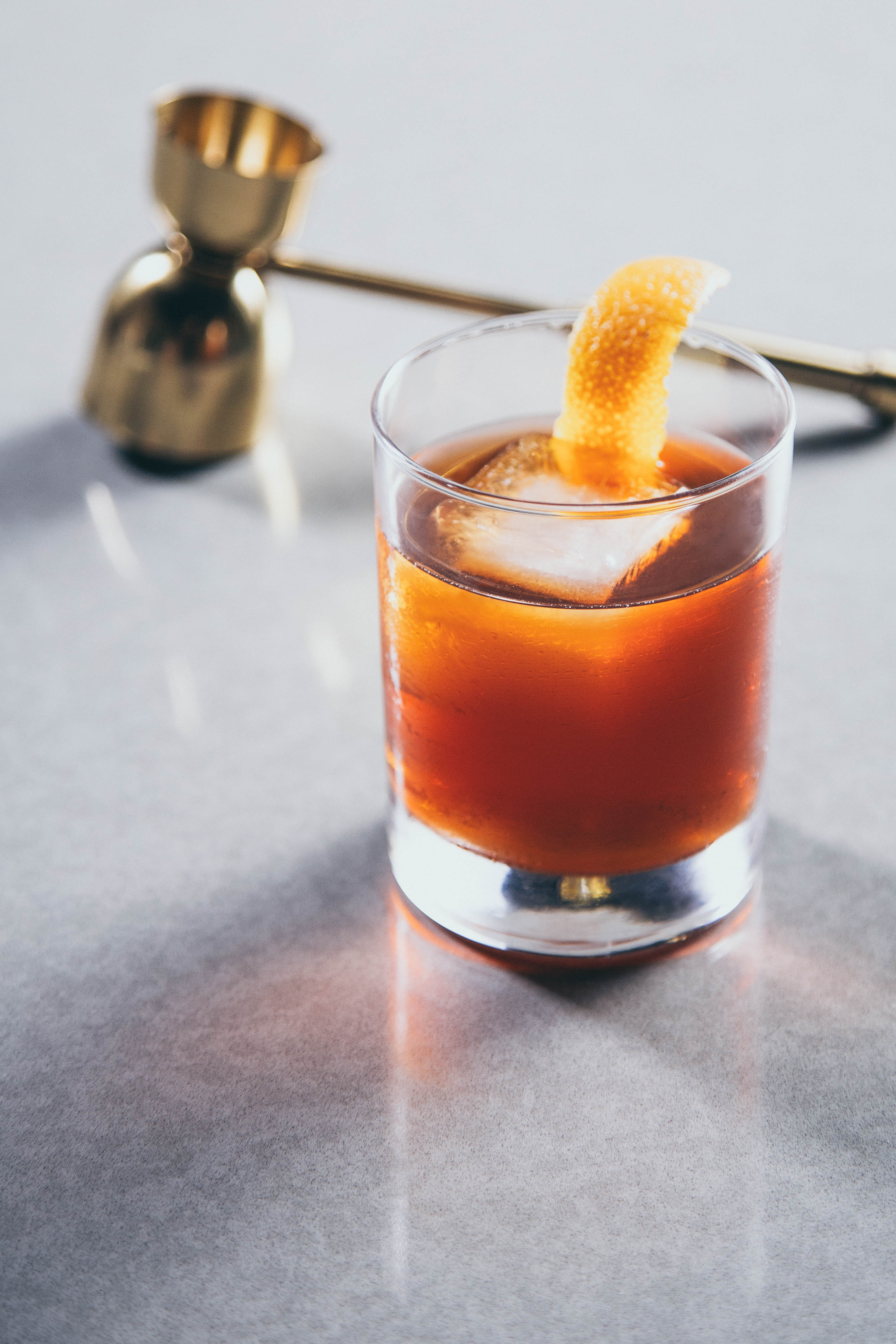 Vieux Carré Cocktail being poured into a glass