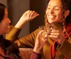Two women drinking whisky