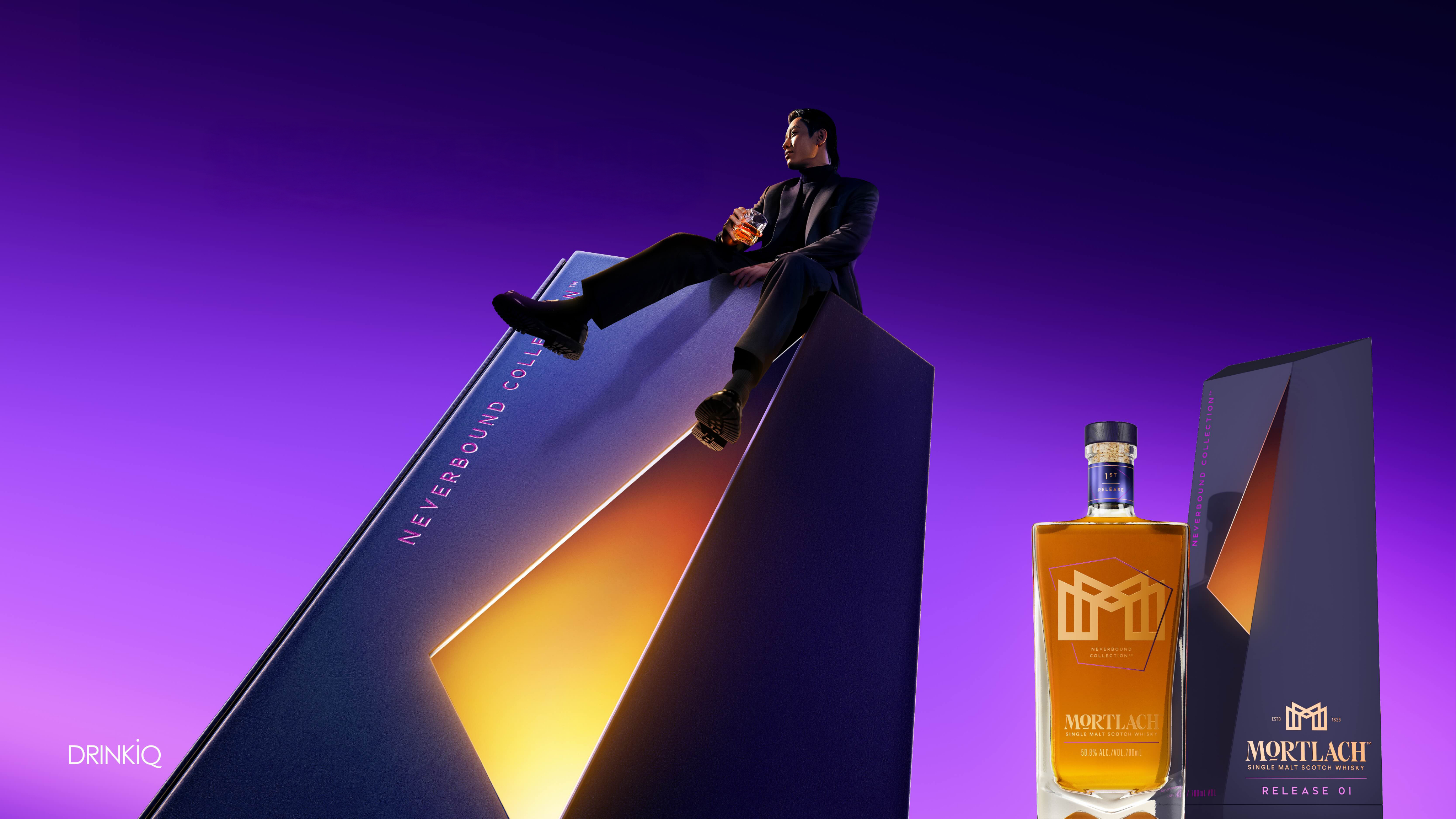 Mortlach Neverbound Collection Release 01 key visual with bottle and male model sitting on packaging with purple background.