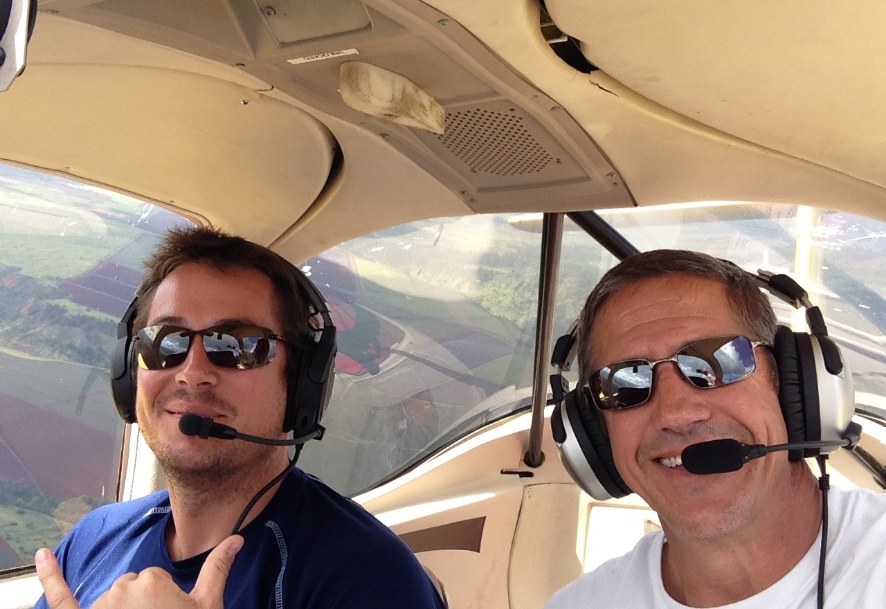 The team from TerraPAC Imagery in the motor glider