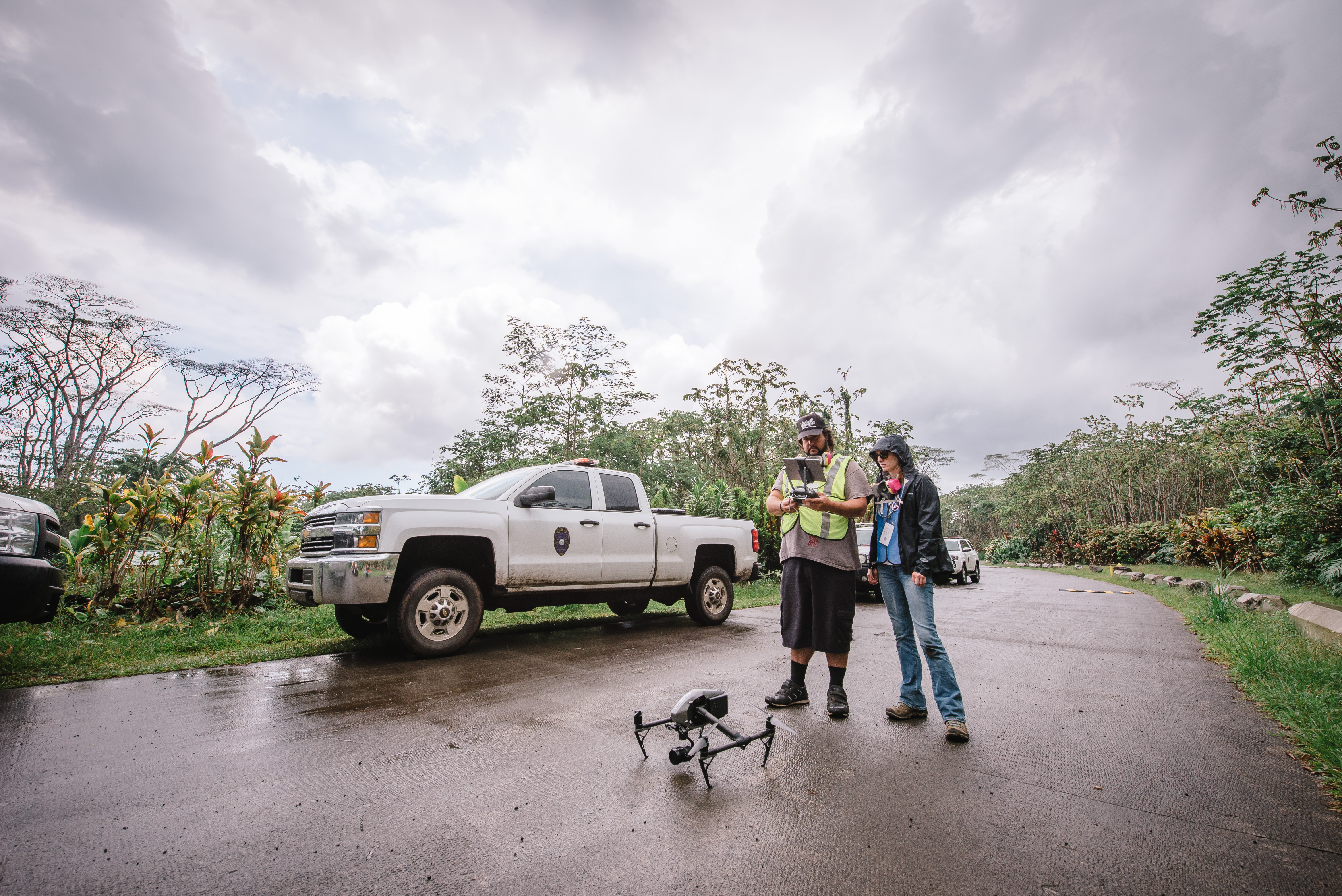 Team members prepare a DJI Inspire 2 drone with RGB camera