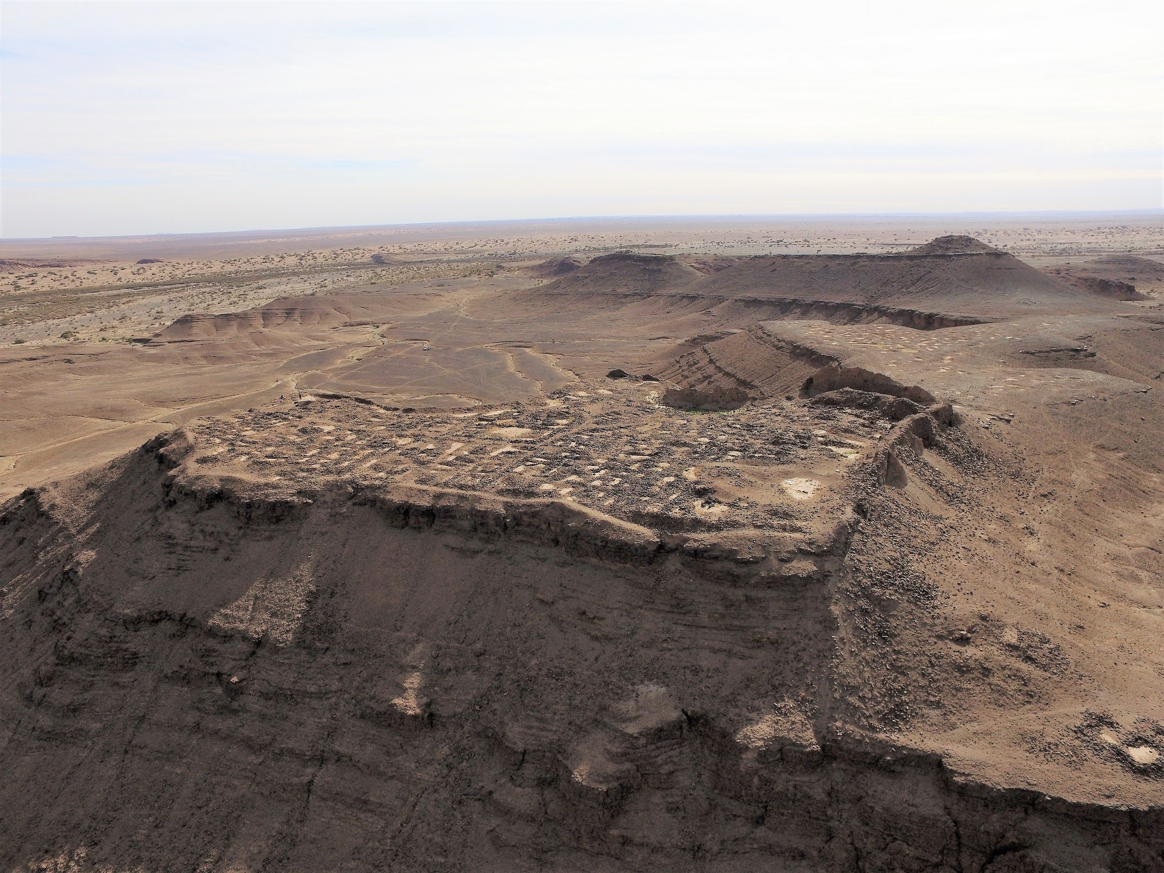 A drone image of an archaeological site in the Sahara desert.