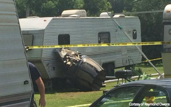 the engine of the F-16 landed next to an RV after the collision