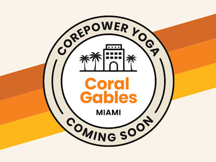 Tan and white CorePower Yoga coming soon target logo with orange Coral Gables lettering in the center and some palm tree icons to symbolize the Miami area