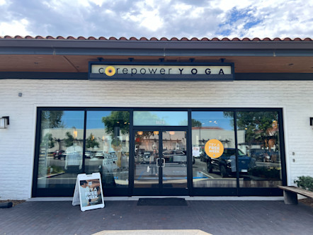 CorePower Yoga sign displayed above the white brick Westlake studio in Santa Barbara