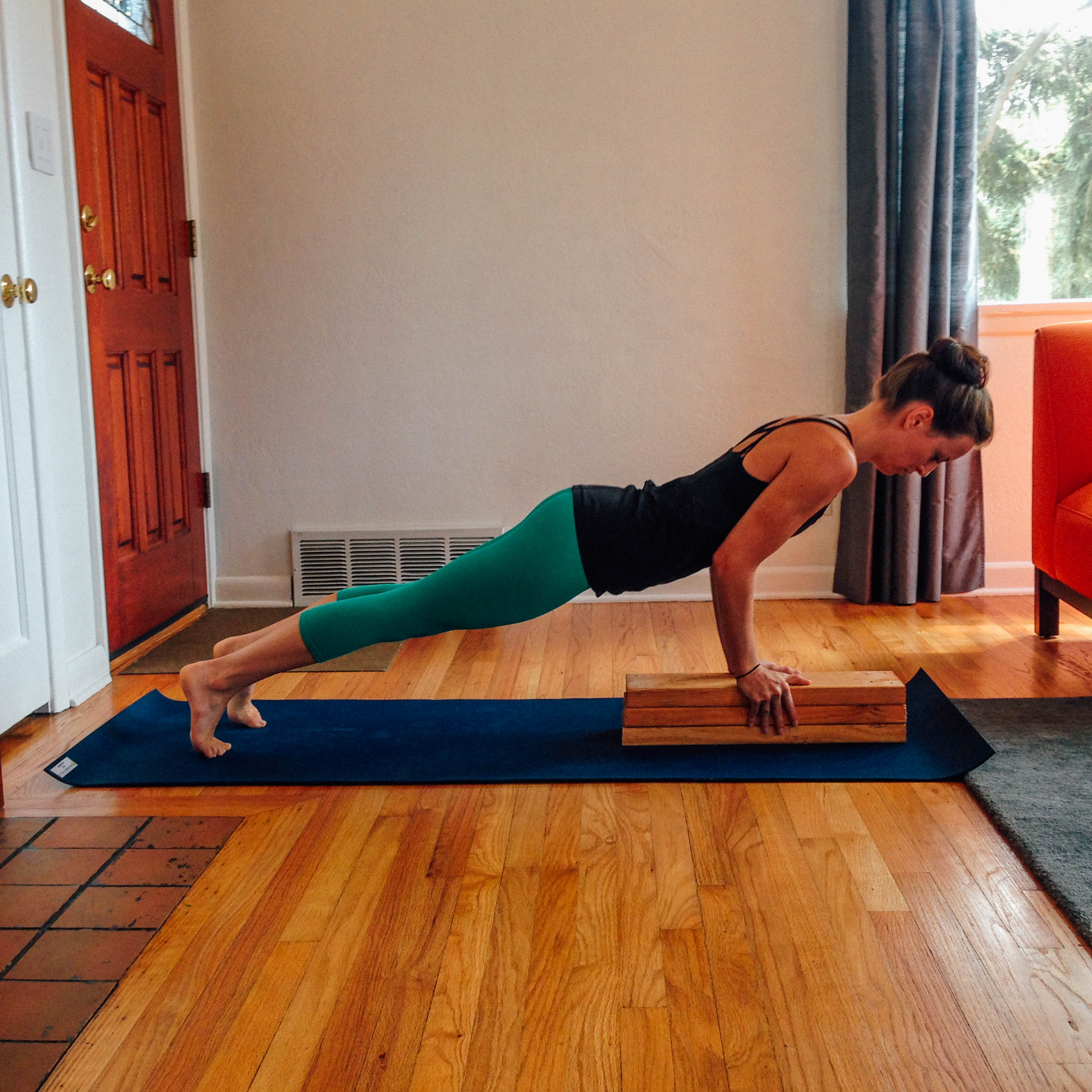 Yoga woman strength training on exercise mat doing yoga poses exercises at  gym. Difficult pose, astavakrasana, asymmetrical arm balance eight Angle  Stock Photo - Alamy