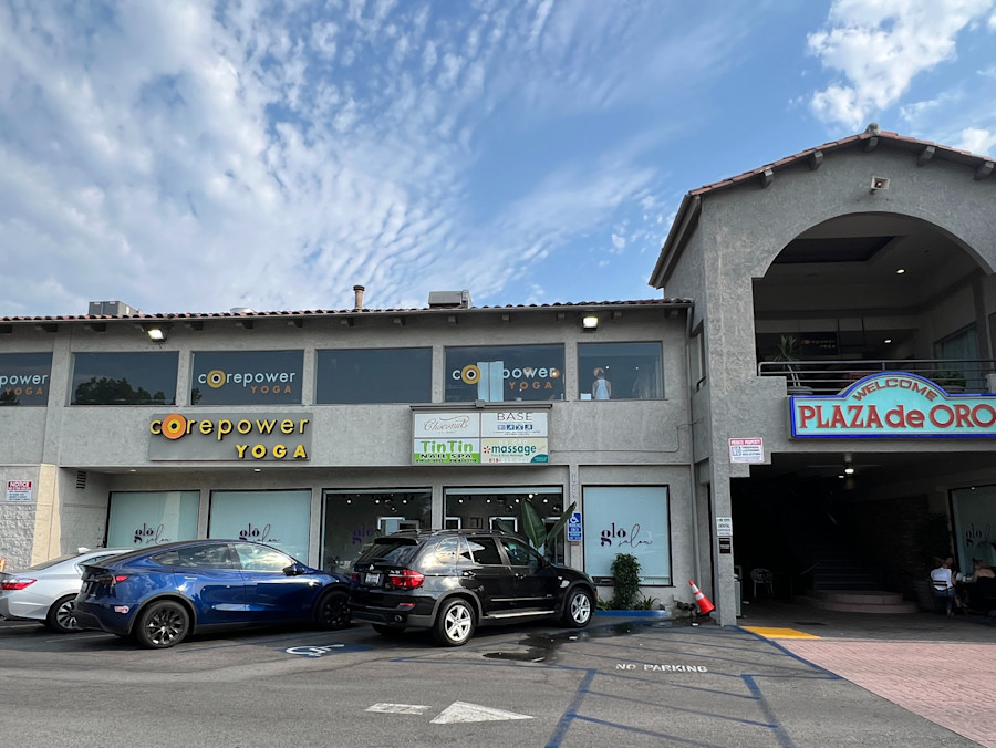 The studio's frontage in the Plaza de Oro building on Ventura Boulevard, CorePower signage above the windows