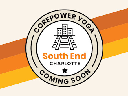 CorePower Yoga South End Charlotte logo with cityscape icon and "COMING SOON" text on orange and yellow striped background
